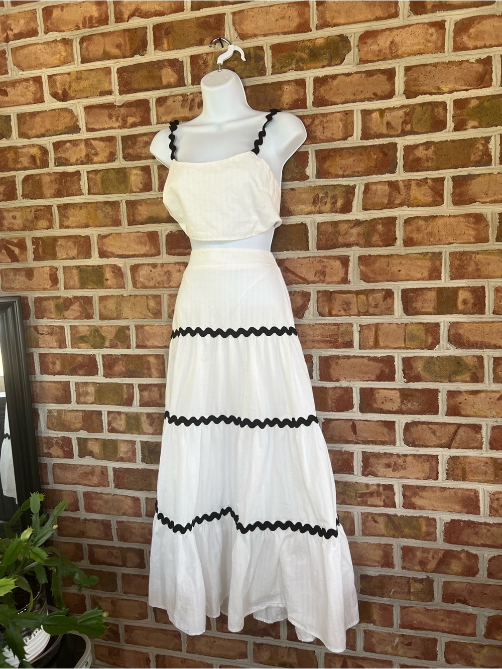 Olivaceous White Two-Piece Maxi Skirt Set with Black Trim. Medium